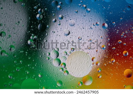 holiday light background. holiday postcard background. oil drops on the water surface