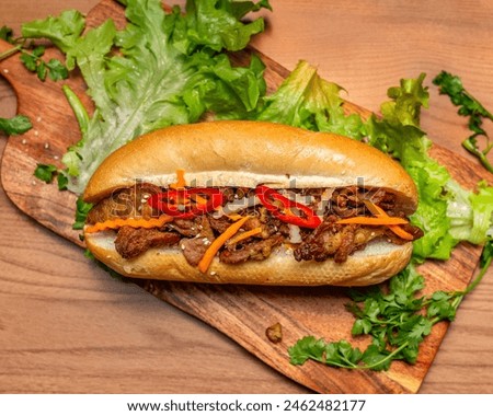 BBQ pork Banh Mi and spring roll Vernieli Salad Royalty-Free Stock Photo #2462482177