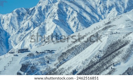 Happo One Ski Resort and the Northern Alps in Midwinter, Hakuba Village, Nagano Prefecture Royalty-Free Stock Photo #2462516851