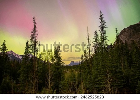 Aurora Borealis, Northern Lights, May 2024, Alberta, Banff, Canada, night sky, celestial, phenomenon, breathtaking, ethereal, vibrant colors, green hues, purple hues, dancing lights, cosmic, amazing