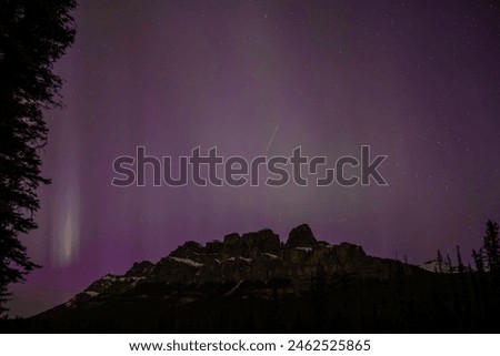 Aurora Borealis, Northern Lights, May 2024, Alberta, Banff, Canada, night sky, celestial, phenomenon, breathtaking, ethereal, vibrant colors, green hues, purple hues, dancing lights, cosmic, amazing