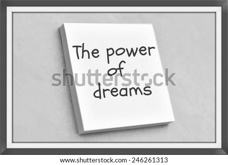 Vintage style text the power of dreams on the short note texture background