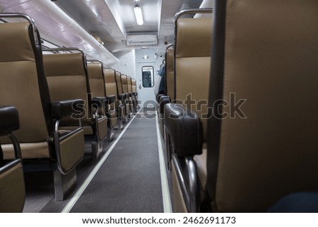 economy class train interior. Inside of  train compartment, in Indonesia, trasportation. stock photo.