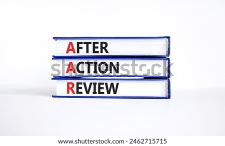 AAR After action review symbol. Concept words AAR After action review on beautiful books. Beautiful white background. Business AAR after action review concept. Copy space.