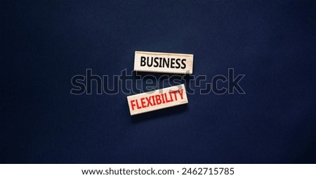Business flexibility symbol. Concept words Business flexibility on beautiful wooden block. Beautiful black paper background. Business flexibility concept. Copy space.