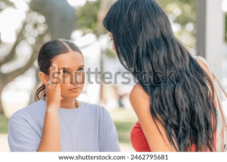 friends arguing or fighting outdoors Royalty-Free Stock Photo #2462795681