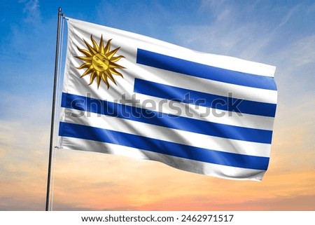 Flag of Uruguay waving flag on sunset view