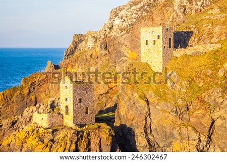 The Crown engine houses perched on the cliffs at Botallack near St Just Cornwall England UK Europe
