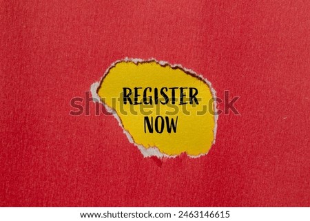 Register now words written on ripped red paper with yellow background. Conceptual register now symbol. Copy space.