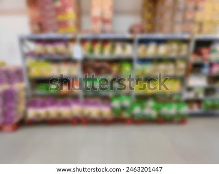 blurry photo of a display of goods in a minimarket