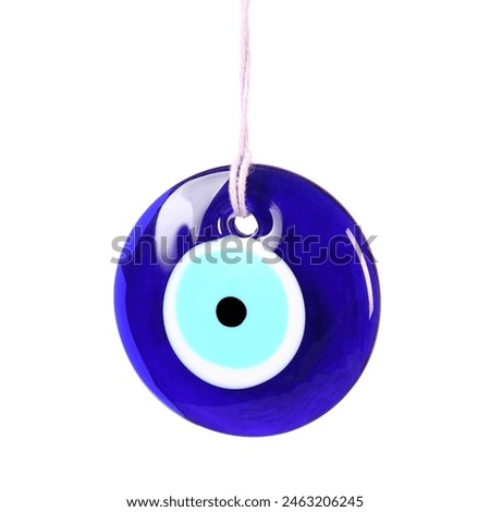 Evil eye amulet hanging on white background
