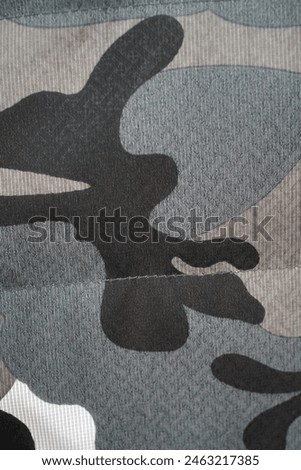 grey camouflage background. camouflage pattern cloth texture. abstract background and texture for design                     