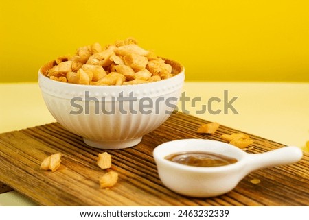 snack spring roll skin (kulpia) in a white bowl with a plain background