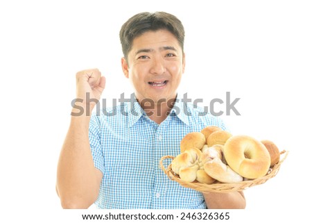 Man smiling with breads