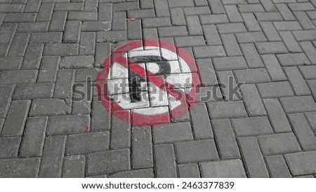 No parking sign on park floor


