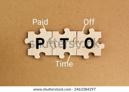 wooden puzzle with the letters PTO or the word Paid time off. According to our report, a significant number of employees.