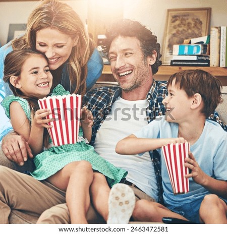 Funny, family and eating popcorn in home living room, laughing and watching movie together on sofa to relax. Parents, kids and food snack for tv, show or streaming comedy for happy children bonding