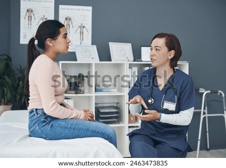 Doctor, woman and patient speaking in office, reproductive health and consultation in checkup for diagnosis. Person, family planning and advice on insurance, communication and medical support or help