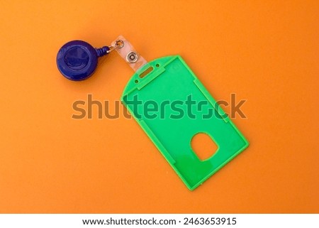 “Retractable Clip Reel Combo”: This name tag holder features a retractable clip reel with a blue casing, perfect for securely displaying ID cards or access badges.