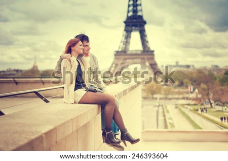 Lovers in Paris with the Eiffel Tower in the Background