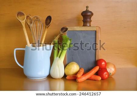 kitchen utensils,vegetables,blackboard for recipes, free copy space