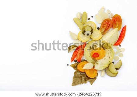 Assorted fermented vegetables. Probiotics, healthy food, vitamins. Vegan lifestyle, pickled dish. Flat lay, isolated on white background, top view Royalty-Free Stock Photo #2464225719