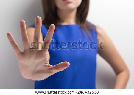 young woman showing her denial with NO on her hand Royalty-Free Stock Photo #246432538