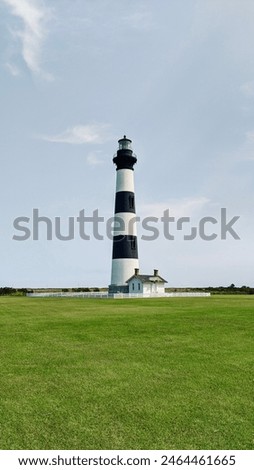 Bodie Island Lighthouse on a beautiful summers day with bright blue skies.