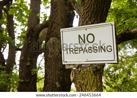 No Trepassing Sign indicating in the countryside - concept image