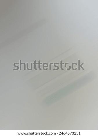 Closeup of Abstract surface motion blurred blue and gray transition or gradient stripes in a white background