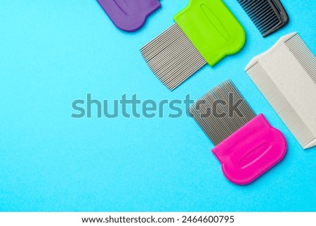 Comb for lice removing on blue background