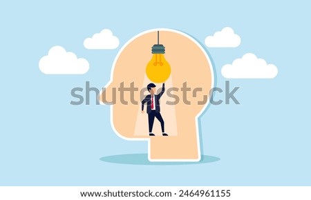 Creative genius brain, smart thinking, emotional intelligence, wisdom, and intuition, concept of Intelligent man activates lightbulb idea inside his brilliant mind