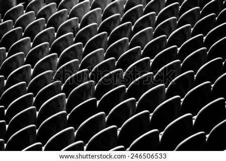 Rows of seats are empty now, but will soon be filled as spectators make their way to the event. Royalty-Free Stock Photo #246506533