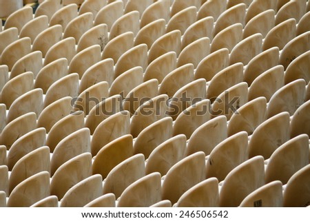 Rows of seats are empty now, but will soon be filled as spectators make their way to the event. Royalty-Free Stock Photo #246506542