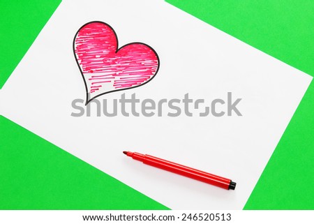 Red heart on white paper. Valentine's Day Concept.