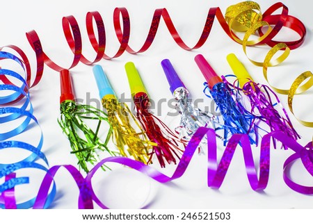 Party Horn Blower with colored streamers on white background