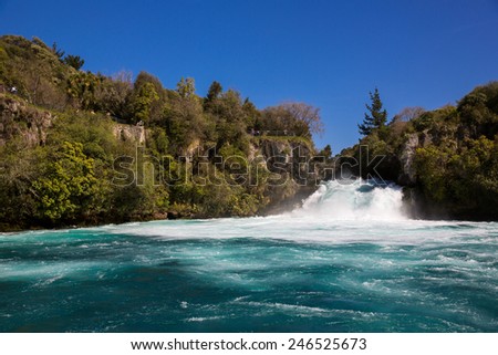 Huka Falls on the Waikato River in New Zealand. Royalty-Free Stock Photo #246525673