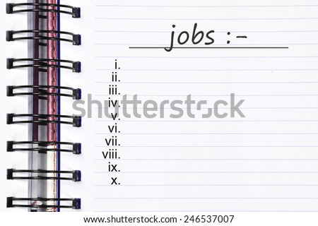 Close up note book and list of jobs
