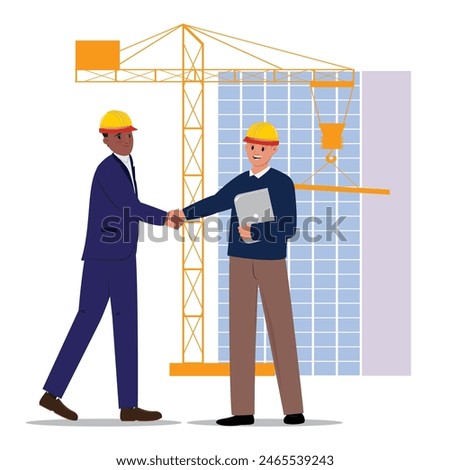 Architect and worker in protective helmets shaking hands, with crane and high-rise building in the background
