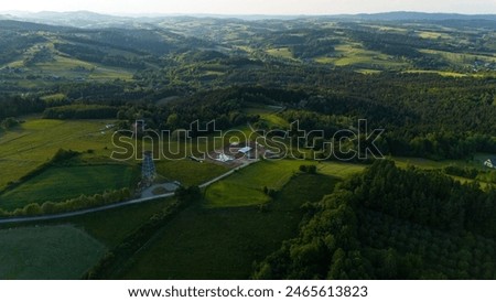 Lookout Tower in Brusnik, near Ciezkowice in Lesser Poland overlooking hills and farmfields'