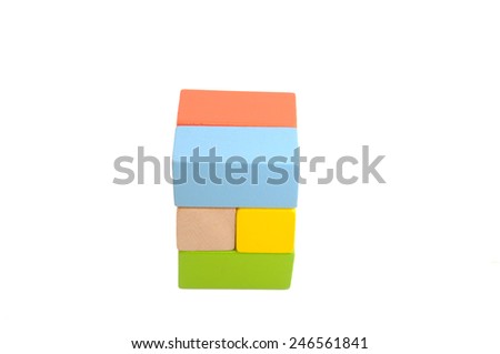 Wooden building block on white background.