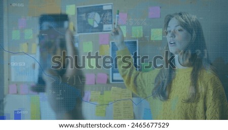 Image of financial data processing over diverse business people in office. global business, finances and digital interface concept digitally generated image.