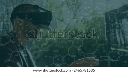 Image of chemical formulas moving over biracial men using vr headset. Global science, connections, data processing and digital interface concept digitally generated image.