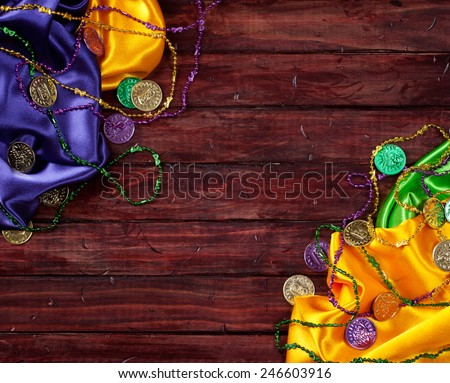 Mardi Gras: Colorful Cloths And Party Trinket Background