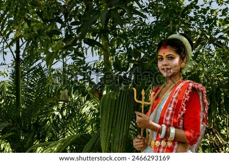  A Concept  of Agomoni photoshoot with village background. Maa Durga agomoni shoot concept.Indian culture Durga puja.
