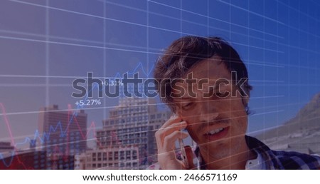 Image of financial data processing over caucasian man using smartphone. Global business, finances, computing and data processing concept digitally generated image.