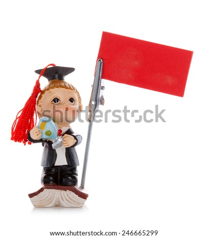 Figurine of a young graduate isolated on white background.