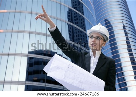 architect woman working outdoor with modern buildings [Photo Illustration]