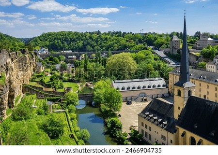 Saint John’s Church or Saint John on the Stone (Eglise Saint-Jean, 1705) in the valley and the river Alzette. Church St Jean of Grund belonged to the Benedictine Abbey of Munster. Luxembourg City.