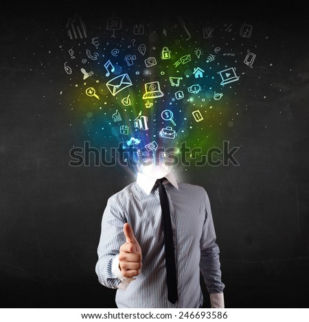 Business man with glowing media icons exploding head concept